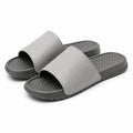Chanclas 38/39 de material sintético gris con plantilla texturizada para uso diario